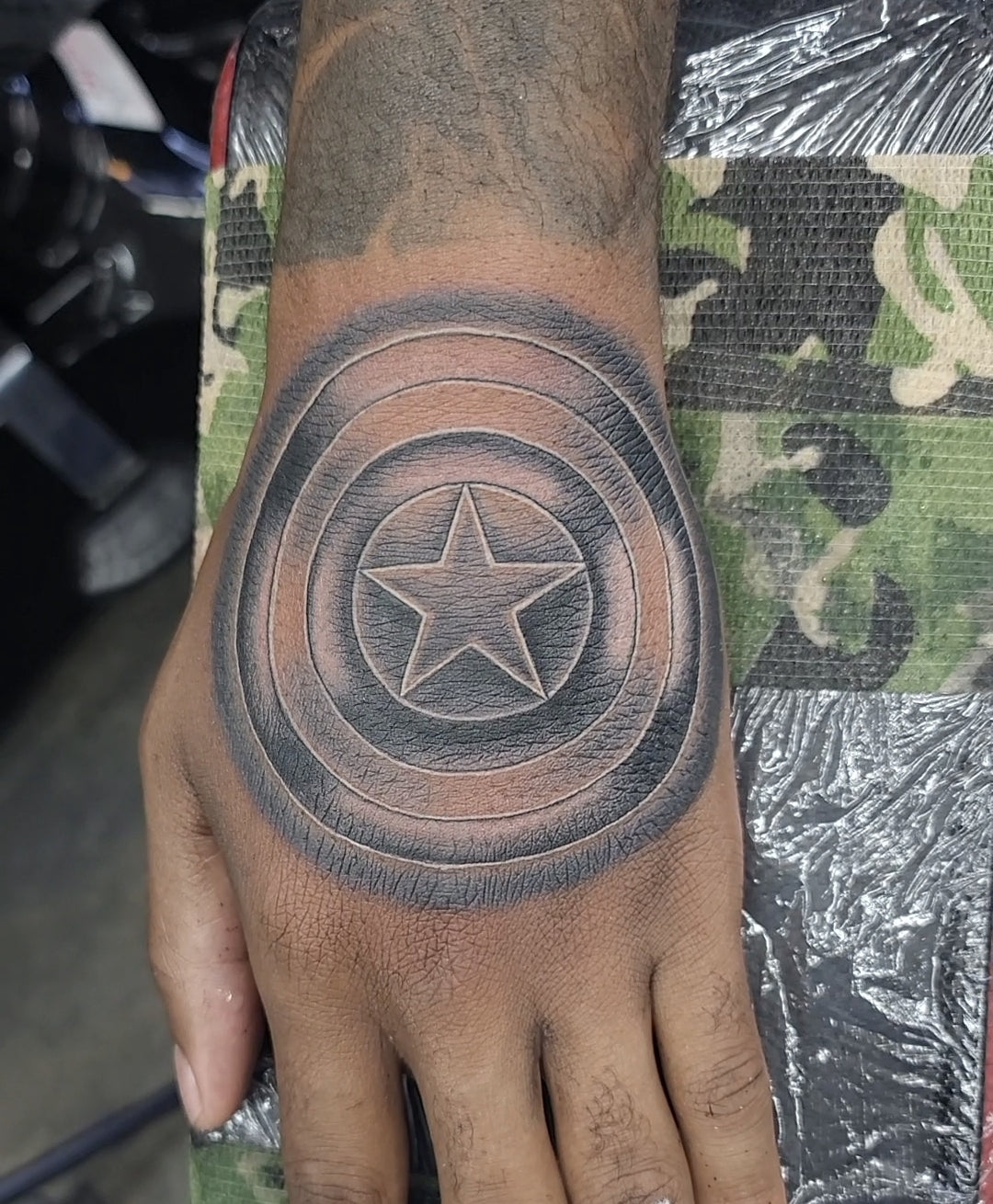 Top Hand Tattoo