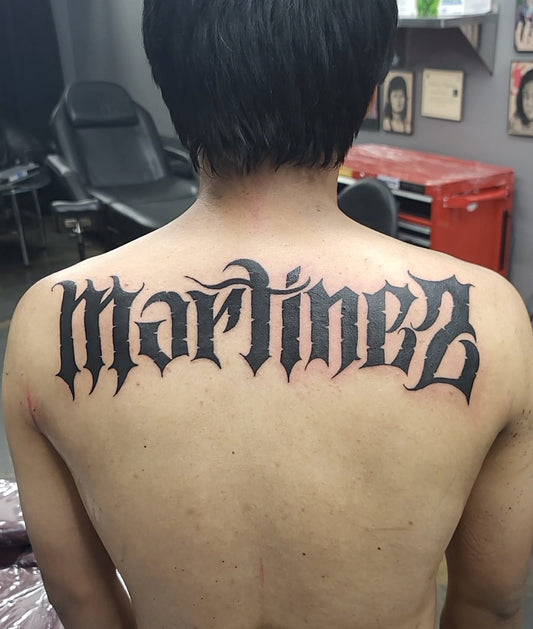 Back Full Name Tattoo
