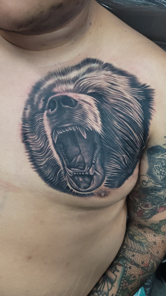 Half Chest Tattoo