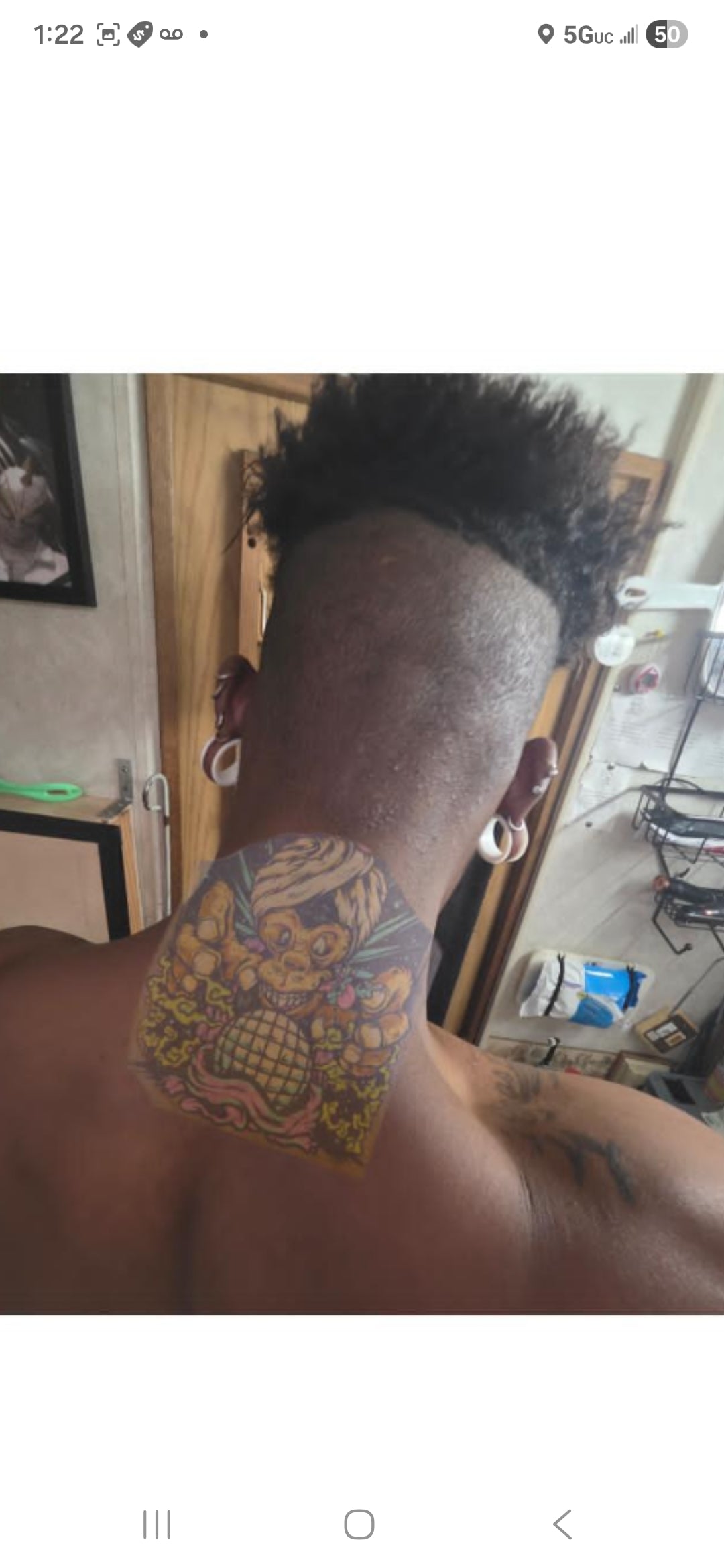 Back of the neck color tattoo